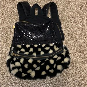 Faux Fur and sequin SUPERCUTE back pack